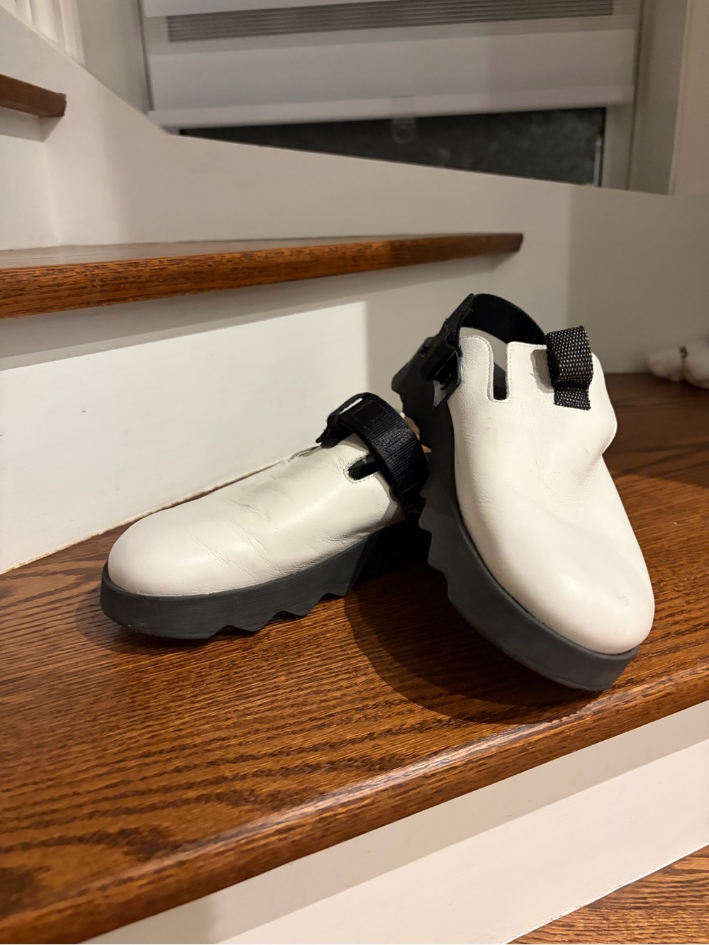 Sorel Women’s White and Black Slip-On Leather Clogs
